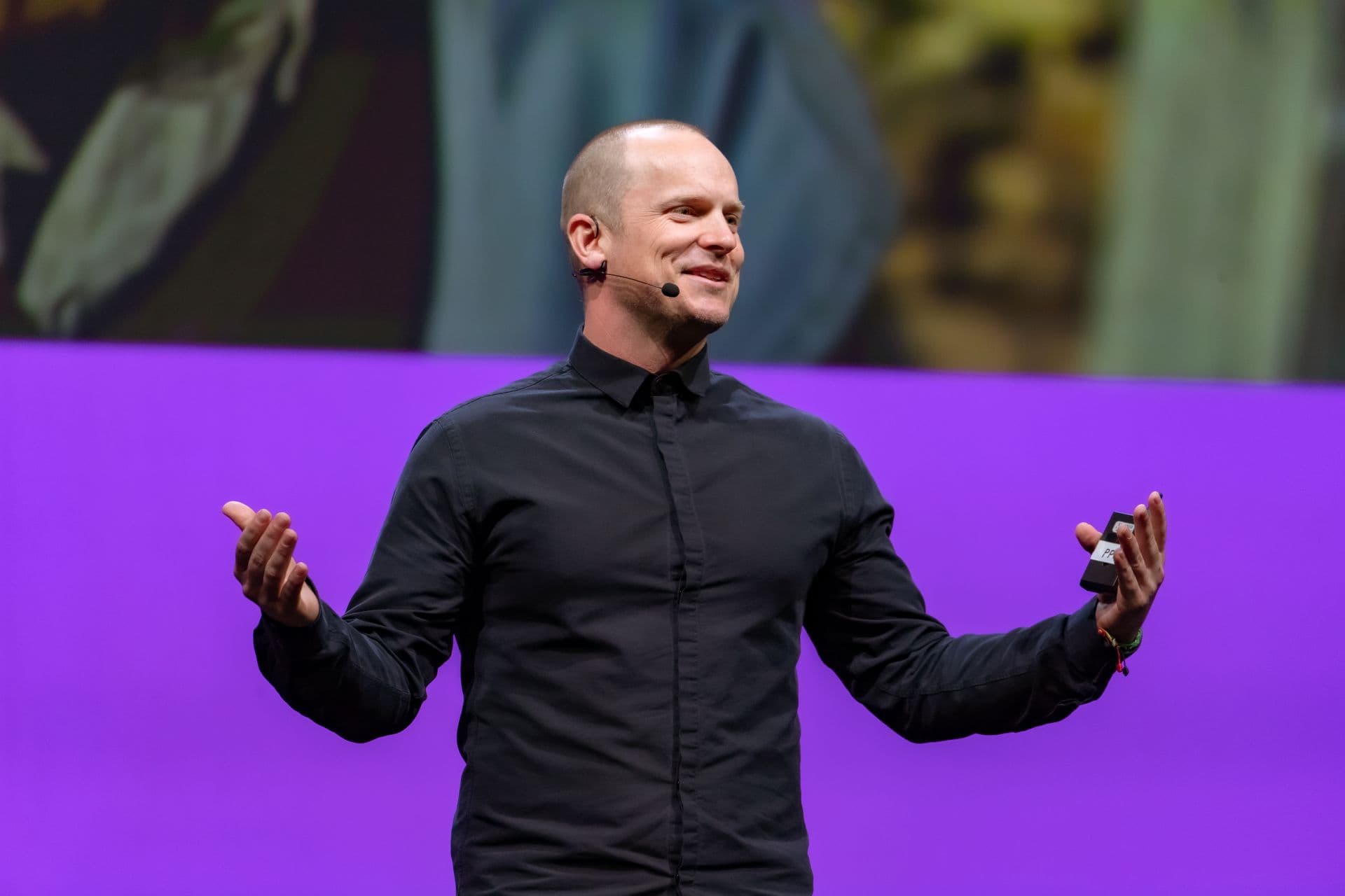 Robert X. Fogarty standing on stage