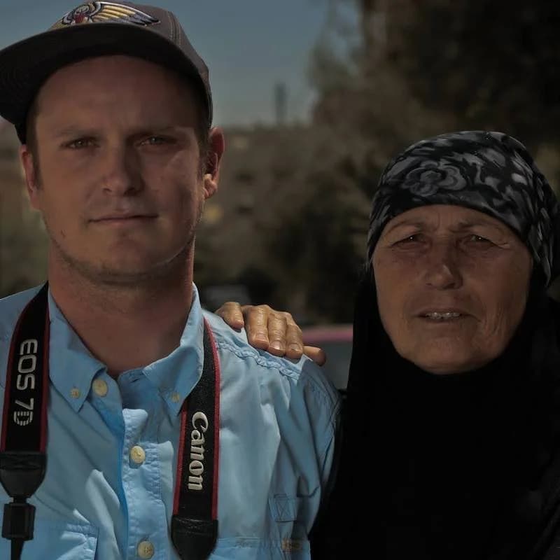 Robert with Syrian Refugee