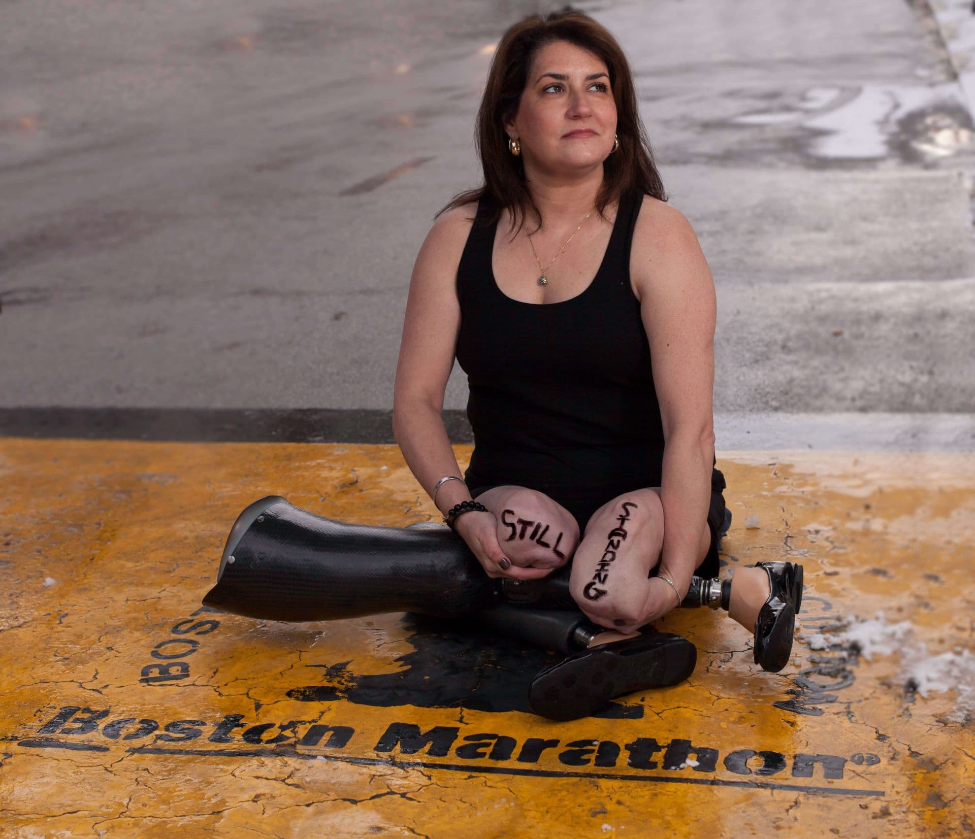 Celeste Corcoran at the Boston Marathon finish line - Still Standing